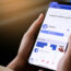 A mobile phone showing facebook advertisement on screen