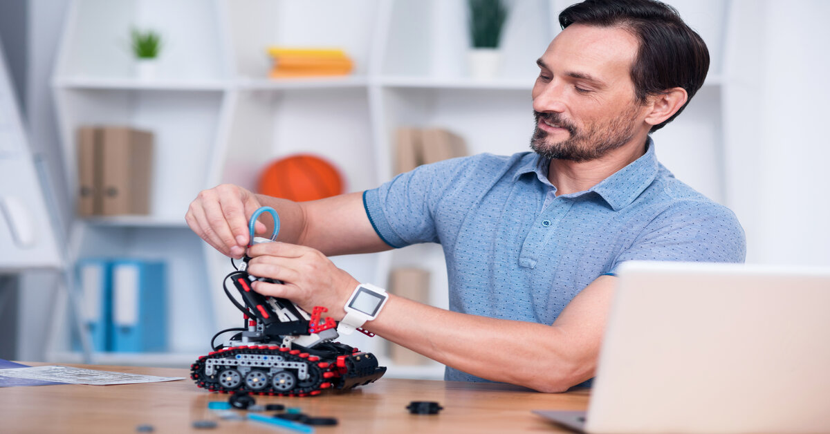 An inventor working on to create a robot